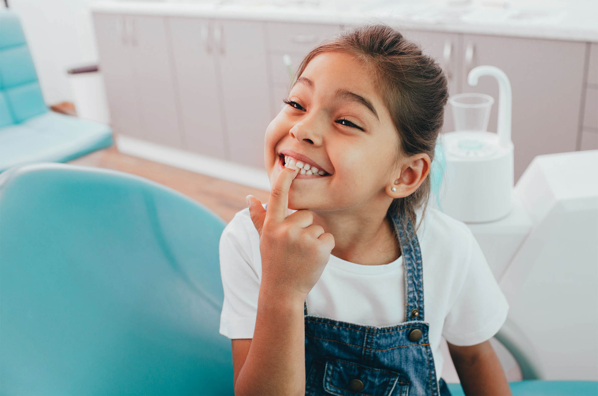 smiling girl at dentist